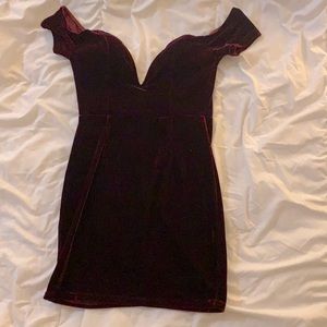 Burgundy velvet mini dress. Deep V in front. Zip in back